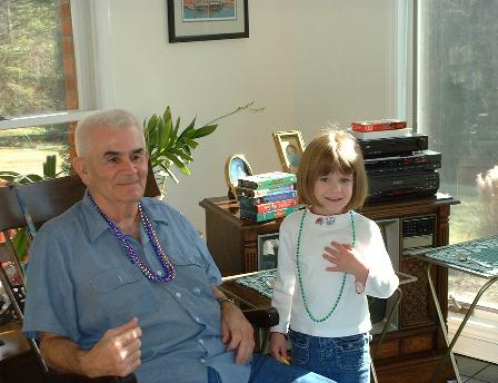 Ted Fulk and Jessica Thoams with Mardi Gras beads!